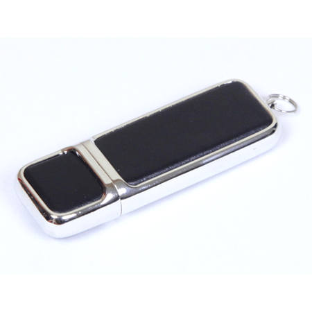 USB флешка Pin черная на 8Гб в кожаном корпусе с металлическими вставками. Размеры: 11*22*65 мм. Логотип рекомендуем наносить методом лазерной гравировки или тампопечатью.  Возможные объемы памяти: 16, 32, 64 GB. Минимальный тираж от 50 штук.