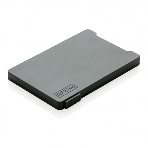 Защитный бокс RFID 2 для кредитных карт черного цвета рассчитан на 5 обычных или 3 рельефных кредитные карты. Бокс RFID 2 способен защитить ваши кредитки от несанкционированных транзакций поскольку в нем есть электромагнитное поле.  Специальный слайдер, расположенный на боковой части, поможет вам без труда извлечь карты из бокса. Размер защитного бокса 0.5*6.5*9.4 см. Изготовлен из пластика. Минимальный тираж 200 шт. Нанести логотип на боксы рекомендуем методом тампопечати.